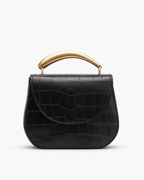 cuyana sculpted handle bag|cuyana luggage.